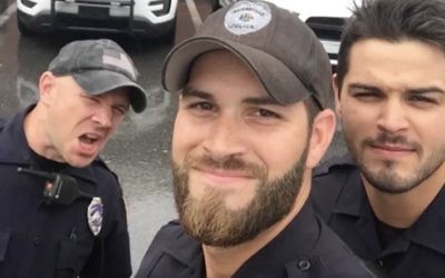 Michael Hamill et deux autres policiers de Floride. (Crédit : Gainesville Police Department /Facebook)