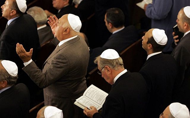 Members of Turkey's Jewish community pray at Neve Shalom Synagogue in Istanbul on October 11, 2004, during a ceremony to mark the official reopening of the synagogue (AP/Murad Sezer) Members of Turkey's Jewish community pray at Neve Shalom Synagogue in Istanbul on October 11, 2004, during a ceremony to mark the official reopening of the synagogue (AP/Murad Sezer)