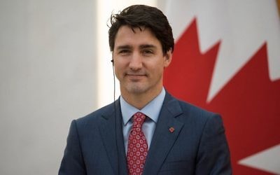Le Premier ministre du Canada, Justin Trudeau, assiste à une conférence de presse avec le Premier ministre chinois Li Keqiang au Grand Palais du Peuple à Beijing le 4 décembre 2017. (Crédit : AFP / Pool / Fred Dufour)