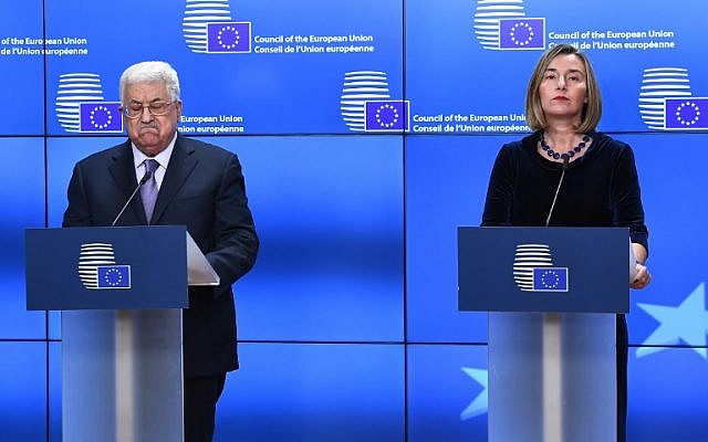Palestinian President Mahmoud Abbas (L) speaks as EU foreign policy chief Federica Mogherini listens prior to attend a EU foreign affairs council at the European Council in Brussels, January 22, 2018. Palestinian leader Mahmud Abbas on January 22 urged EU member states to "swiftly" grant official recognition to the state of Palestine as he arrived to meet foreign ministers from the bloc in Brussels.
EMMANUEL DUNAND / AFP Palestinian President Mahmoud Abbas (L) speaks as EU foreign policy chief Federica Mogherini listens prior to attend a EU foreign affairs council at the European Council in Brussels, January 22, 2018. Palestinian leader Mahmud Abbas on January 22 urged EU member states to "swiftly" grant official recognition to the state of Palestine as he arrived to meet foreign ministers from the bloc in Brussels.
EMMANUEL DUNAND / AFP