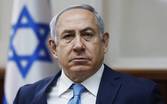 Le Premier ministre Benjamin Netanyahu assiste à une réunion du Cabinet au bureau du Premier ministre à Jérusalem le 11 février 2018. (AFP PHOTO / PISCINE / RONEN ZVULUN) Le Premier ministre Benjamin Netanyahu assiste à une réunion du Cabinet au bureau du Premier ministre à Jérusalem le 11 février 2018. (AFP PHOTO / PISCINE / RONEN ZVULUN)