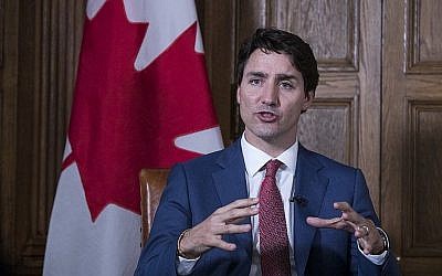 Le Premier ministre canadien Justin Trudeau parle à des journaliste de l'AFP à Ottawa, le 9 mai 2018. (Crédit : AFP/Lars Hagberg) Le Premier ministre canadien Justin Trudeau parle à des journaliste de l'AFP à Ottawa, le 9 mai 2018. (Crédit : AFP/Lars Hagberg)