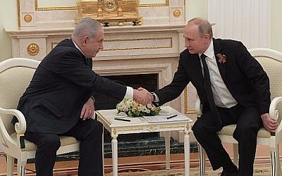 Le Premier ministre Netanyahu et le président russe Vladimir Poutine au Kremlin, le 9 mai 2018. (Amos Ben Gerschom / GPO