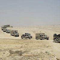 Des soldats prennent part à  un exercice simulant une guerre à Gaza, le 17 juillet 2018. (Crédit : Ministère de la Défense)