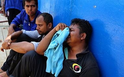 Photo d'illustration. Des migrants secourus à bord d'un bateau, le 1er août 2018. (Crédit : / AFP PHOTO / FATHI NASRI)