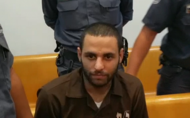 Le terroriste de Haïfa Mohammad Shinawi, au tribunal. (Crédit : capture d'écran Dixième chaine) Le terroriste de Haïfa Mohammad Shinawi, au tribunal. (Crédit : capture d'écran Dixième chaine)