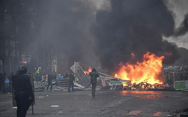 La police anti-émeutes place de la Concorde à Paris, le 24 novembre 2018 (Crédit : Photo by Bertrand GUAY / AFP)