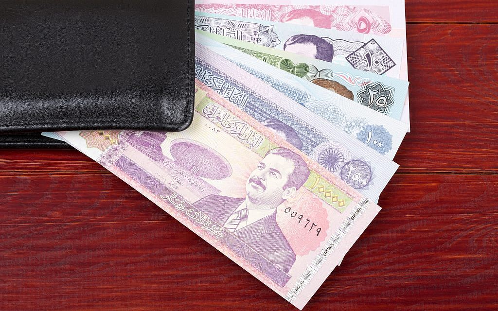 illustration : des dinars irakiens. (Crédit : iStock) illustration : des dinars irakiens. (Crédit : iStock)