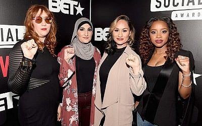 Les organisatrices de la Women’s March, de gauhe à droite Bob Bland, Linda Sarsour, Carmen Perez et Tamika Mallory à Atlanta,, le 11 févrirer 2018. Crédit : Paras Griffin/Getty Images for BET via jTA)