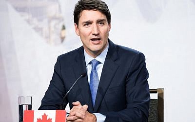 Le Premier ministre du Canada, Justin Trudeau, lors d'une réunion entre les Premiers ministres des provinces canadiennes à Montréal, le 7 décembre 2018. (Crédit : MARTIN OUELLET-DIOTTE / AFP)