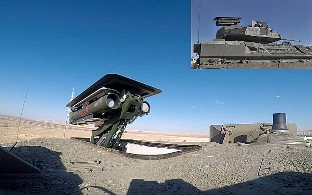 Un système de missile anti-chars sans pilote Spike est vu au sommet de la tourelle d'un véhicule de transport de troupes blindé Namer. (Crédit : ministère de la Défense) Un système de missile anti-chars sans pilote Spike est vu au sommet de la tourelle d'un véhicule de transport de troupes blindé Namer. (Crédit : ministère de la Défense)
