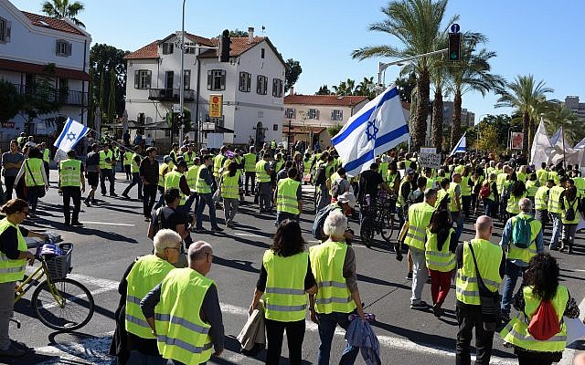 Défilé de "Gilets jaunes" à Tel Aviv, le 14 décembre 2018 (Crédit : Gili Yaari/FLASH90) Défilé de "Gilets jaunes" à Tel Aviv, le 14 décembre 2018 (Crédit : Gili Yaari/FLASH90)