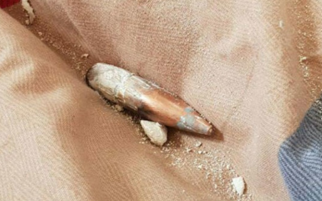 A bullet that hit a home in Nitzana and was apparently fired from Egypt, December 20, 2018. (Courtesy) A bullet that hit a home in Nitzana and was apparently fired from Egypt, December 20, 2018. (Courtesy)