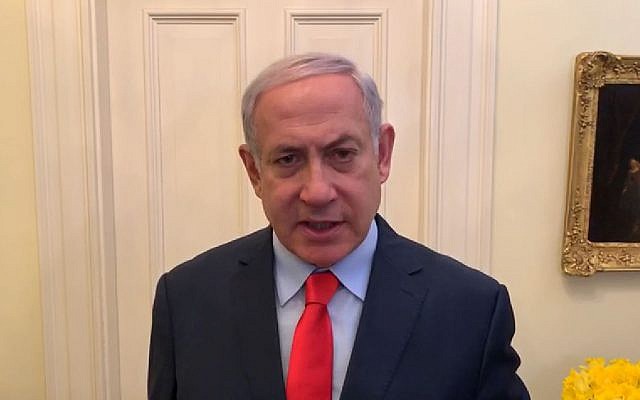 Capture d'écran d'une vidéo du Premier ministre Benjamin Netanyahu filmée depuis Washington, annonçant qu'il écourte son séjour aux Etats-Unis après un tir de roquette, le 5 mars 2019. (Crédit : Bureau du Premier ministre) Capture d'écran d'une vidéo du Premier ministre Benjamin Netanyahu filmée depuis Washington, annonçant qu'il écourte son séjour aux Etats-Unis après un tir de roquette, le 5 mars 2019. (Crédit : Bureau du Premier ministre)