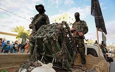 Des combattants des Brigades Al-Qods, la branche militaire du groupe terroriste du Jihad islamique, participent à une marche militaire dans la ville de Rafah, au sud de la bande de Gaza, le 15 novembre 2018. (Abed Rahim Khatib/ Flash90) Des combattants des Brigades Al-Qods, la branche militaire du groupe terroriste du Jihad islamique, participent à une marche militaire dans la ville de Rafah, au sud de la bande de Gaza, le 15 novembre 2018. (Abed Rahim Khatib/ Flash90)