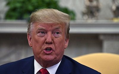Le président américain Donald Trump dans le bureau ovale de la Maison Blanche à Washington, le 9 juillet 2019. (Nicholas Kamm/AFP)