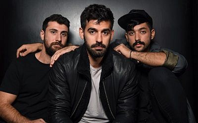 De gauche à droite, les musiciens Haig Papazian, Carl Gerges et Hamed Sinno de Mashrou' Leila posent pour une photo le 1er novembre 2017 à New York. (Crédit :  
 / AFP PHOTO / ANGELA WEISS / TO GO WITH AFP STORY BY SHAUN TANDON)