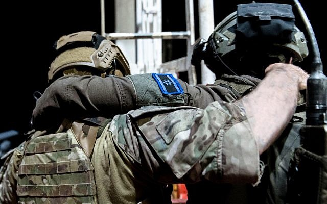 Des forces spéciales israéliennes et américaines simulent la prise d'assaut d'un navire marchant transportant de la contrebande en Mer Méditerranée dans le cadre d'un large exercice naval Nobel Rose en août 2019. (Crédit: Tsahal)