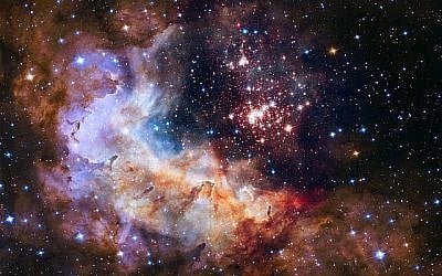 Cette photo non datée fournie par la NASA a été prise par le télescope spatial Hubble qui montre une amas d'étoiles dans la Constellation Carina, il y a 20 000 années lumière de la terre. (NASA/ESA/Hubble Heritage Team/A. Nota, Westerlund 2 Science Team via AP)