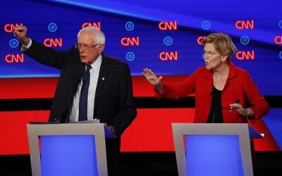 Photo d'illustration : Le sénateur Bernie Sanders (Indépendant -Vermont) et la sénatrice Elizabeth Warren (Démocrate-Massachusetts)  pendant le premier de deux débats de la nomination démocrate à la présidentielle sur CNN à Detroit, le 30 juin 2019 (Crédit : AP Photo/Paul Sancya)