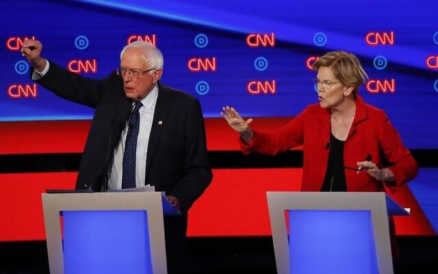 Photo d'illustration : Le sénateur Bernie Sanders (Indépendant -Vermont) et la sénatrice Elizabeth Warren (Démocrate-Massachusetts)  pendant le premier de deux débats de la nomination démocrate à la présidentielle sur CNN à Detroit, le 30 juin 2019 (Crédit : AP Photo/Paul Sancya)