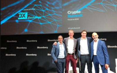 Les représentants de DX.Exchange au sommet des crypto-devises de Bloomberg à Londres, au mois de décembre 2018 (Crédit : Facebook)