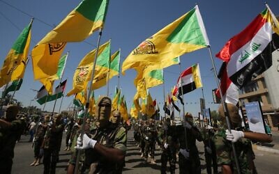 Des combattants chiites irakiens des brigades du Hezbollah soutenues par l'Iran défilent lors d'un défilé militaire à Bagdad le 31 mai 2019. (Photo AHMAD AL-RUBAYE / AFP) Des combattants chiites irakiens des brigades du Hezbollah soutenues par l'Iran défilent lors d'un défilé militaire à Bagdad le 31 mai 2019. (Photo AHMAD AL-RUBAYE / AFP)