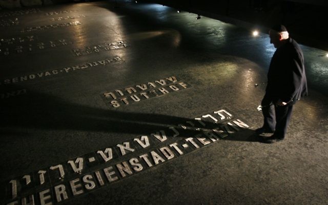 A Holocaust survivor at the Yad Vashem Holocaust Museum in Jerusalem. (photo credit: Michal Fattal/Flash90)