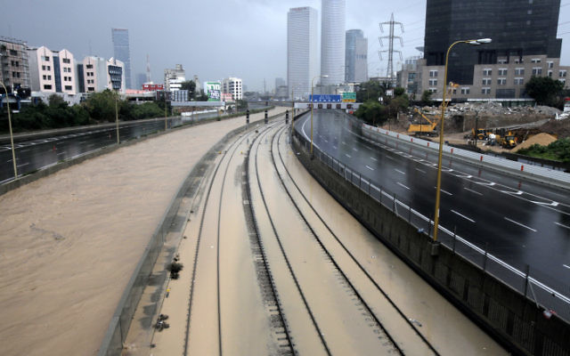 Flooded railway lines alongside the Ayalon River in Tel Aviv, Tuesday. Jan 8 2012. (Photo by Flash90) Flooded railway lines alongside the Ayalon River in Tel Aviv, Tuesday. Jan 8 2012. (Photo by Flash90)