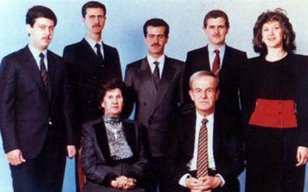 The Assad family in 1994. Front: Hafez Assad and Anisa Makhlouf. Rear, left to right: Maher, Bashar, Bassel, Majid, and Bushra Assad (photo credit: via Wikipedia)