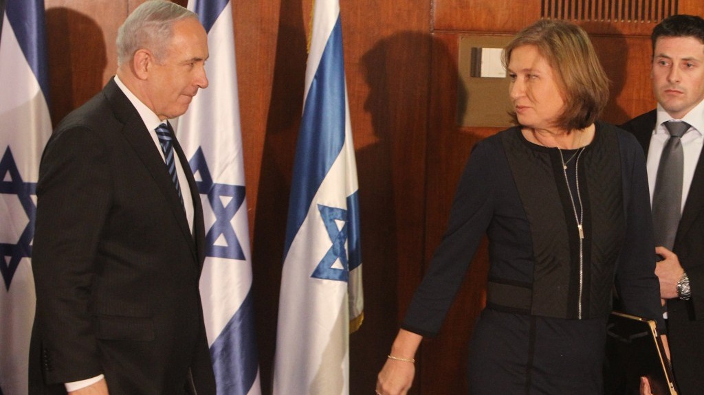 Prime Minister Benjamin Netanyahu and leader of the Hatnua party, Tzipi Livni, seen during a joint press conference, where Livni announced she was joining Netanyahu's government as the minister of justice, February 19, 2013. (Photo credit: Miriam Alster/FLASH90)