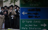 Thousands of ultra-Orthodox Jews holding a prayer rally in Jerusalem's Shabbat Square in opposition of the government's plan to start drafting yeshiva students into military and national service, June 25, 2012 (photo credit: Yonatan Sindel/Flash90)