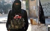 Un membre du groupe djihadiste Al-Nusra à Alep, le 11 janvier 2014 (Crédit AFP - Aleppo Media Center/AFP/Archives Baraa al-Halabi)