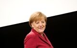 La Chancelière allemande Angela Merkel arrive à une conférence de presse, le 14 mars 2014. (Crédit : AFP/dpa/Nicolas Armer/Germany out)