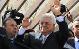 Le président de l'Autorité palestinienne, Mahmoud Abbas, à son retour de Washington, à Ramallah, le 20 mars 2014. (Crédit : Issam Rimawi/Flash90)