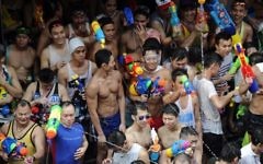 Célébrations du festival Songkran qui marque le Nouvel An en Thailande - 13 avril 2014 (Crédit Christophe Archambault AFP)