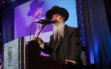Rav Avraham Yossef lors d'une conférence du parti Shas au Centre des Congrès de Jérusalem, le 8 avril 2012 (Crédit : Uri Lenz/Flash90 )
