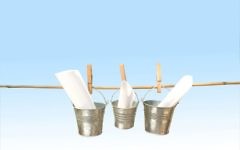 http://www.shutterstock.com/pic-164628755/stock-photo-concept-three-galvanized-buckets-pegged-on-bamboo-stick-with-blue-background.html?src=pp-same_artist-164628665-xNI9eNZRC0j71W4HrTzsKw-1