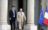 Gil Taieb et Roger Cukierman sortant de l'Élysée, en juillet 2014. (Crédit : AFP)