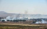 Fumée sortie du plateau du Golan à la frontière avec Israël (Crédit : Flash 90)