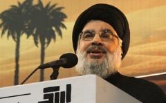 Hassan Nasrallah pendant la procession de l'Achoura à Beyrouth, le 3 novembre 2014. (Crédit : AFP/STR)