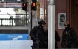 Sydney : le preneur d'otages réclame un drapeau de l'EI, évoque 4 bombes  (Crédit : AFP PHOTO / SAEED KHAN)
