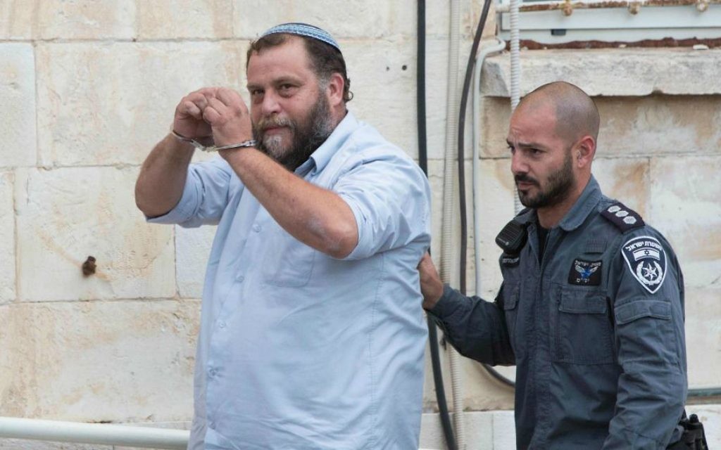 Le président de Lehava, Benzi Gopstein, amené à la cour de Jérusalem, le 16 décembre 2014. (Crédit : Yonathan Sindel/Flash90)