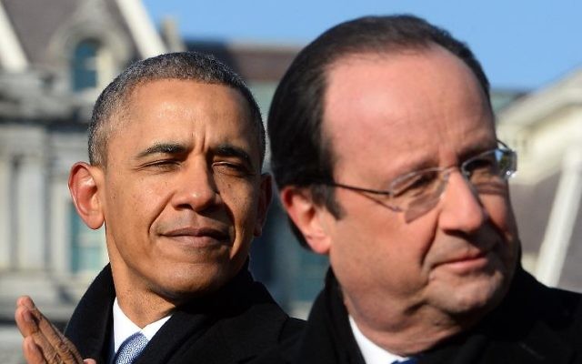 Le président français François Hollande (à droite) et le président américain Barack Obama sur la pelouse de la Maison Blanche, le 11 février 2014. (Crédit : AFP/Jewel Samad) Le président français François Hollande (à droite) et le président américain Barack Obama sur la pelouse de la Maison Blanche, le 11 février 2014. (Crédit : AFP/Jewel Samad)