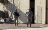 Illustration : Les soldats américains dans le complexe de la base de Taji qui accueille les troupes irakiennes et américaines, le 29 décembre 2014. (Crédit : AFP / ALI AL-SAADI)