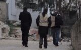 Des militants du Conseil œcuménique des Eglises en Cisjordanie (Crédit : Capture d'écran YouTube)