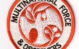 Badge de la Multinational Force and Observers (Crédit  : Domaine public/Wikipédia)