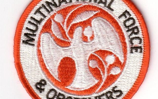 Badge de la Multinational Force and Observers (Crédit  : Domaine public/Wikipédia)
