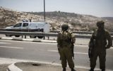 Des soldats israéliens sur une route au nord de Jérusalem en Cisjordanie  (Crédit photo: Hadas Parush / Flash90)