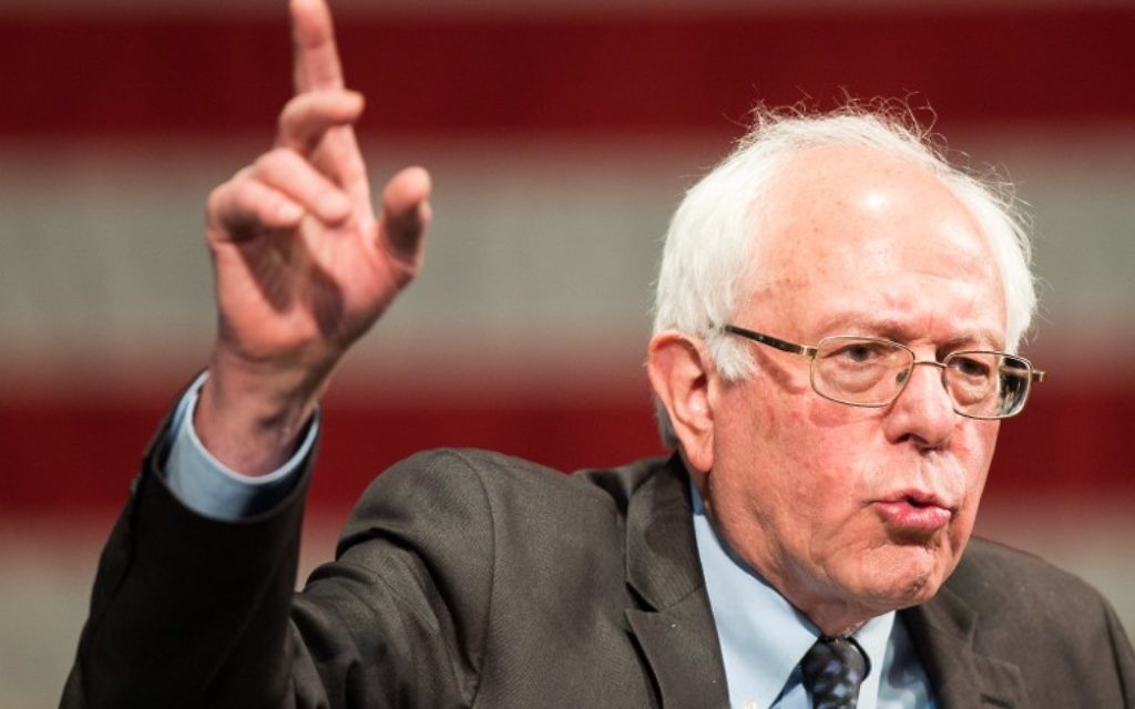 Bernie Sanders pendant un rassemblement à Dearborn, Michigan, le 7 mars 2016. (Crédit : Geoff Robins/AFP) Bernie Sanders pendant un rassemblement à Dearborn, Michigan, le 7 mars 2016. (Crédit : Geoff Robins/AFP)